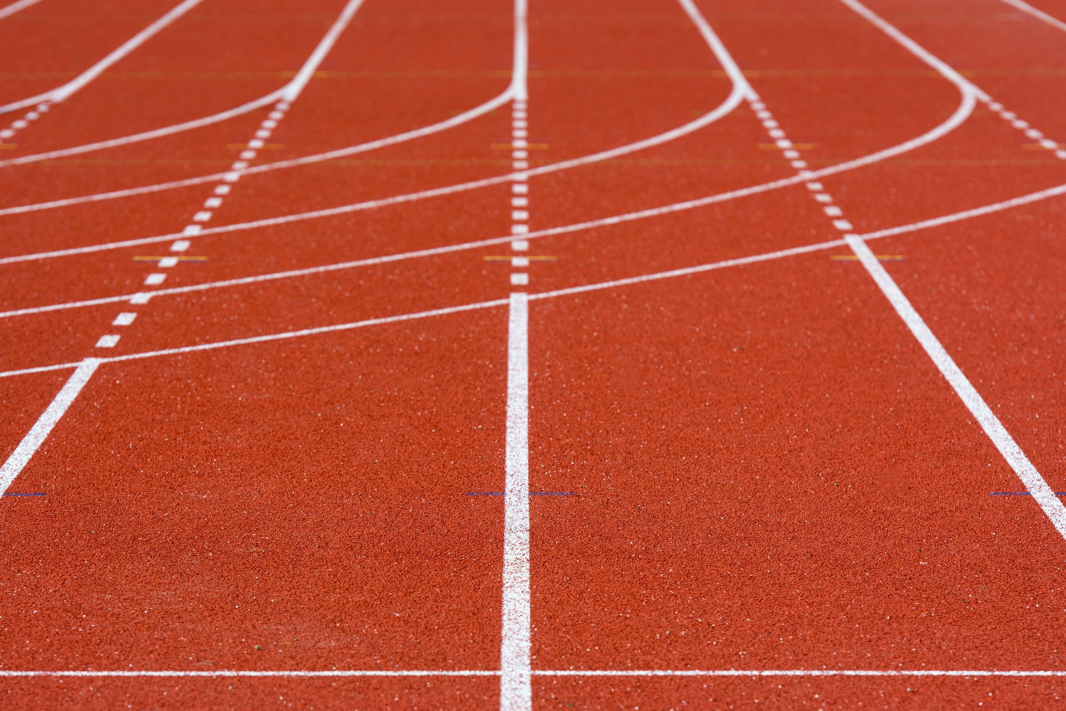 Marked lanes on an outdoor athletics track